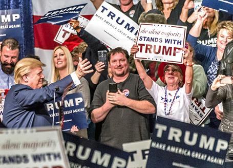 Donald Trump speaking to supporters at a campaign rally
