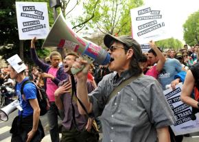 Demonstrators march on May Day in Paris in a protest that united all the trade union federations