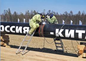 At work on a pipeline designed to transport natural gas from Russia to China