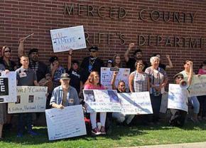 Community members rally in support of hunger strikers at the Merced County jail